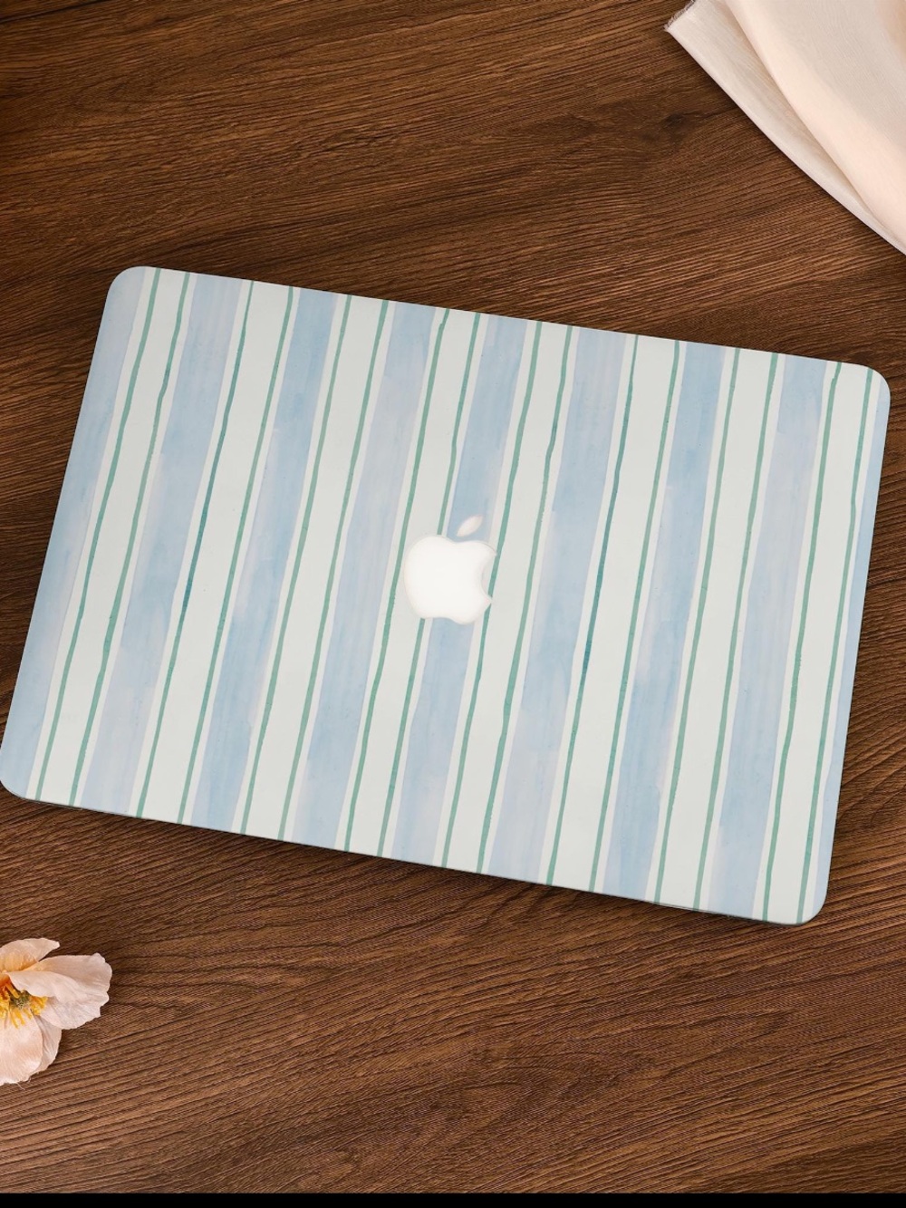 Apple Logo Laptop with Light Blue, White, and Green Striped Case